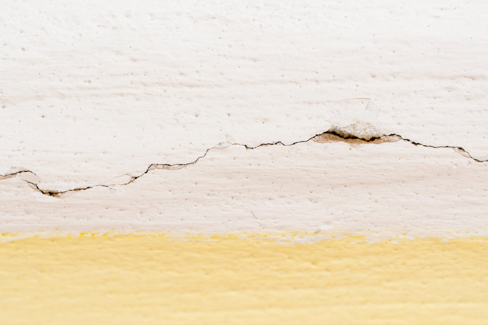 How Professional Painters Use Paint to Mask Surface Imperfections in Older Homes